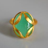 SIJS, emerald cabochon ring, big cabochon emerald, emerald engagement ring singapore, cage gold ring, colombian emerald ring, bespoke jewelry singapore, custom jewellery singapore, emerald 22k gold ring